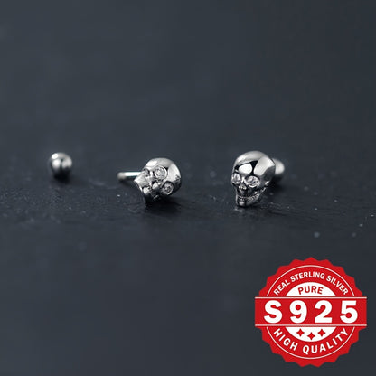A Set of Skull-Shaped Earrings Made from S925 Sterling Silver, Featuring a Spiral Design And Adorned with Synthetic Zirconia. These Stylish And Timeless Earrings Are Perfect for Halloween And Are Designed to Minimize Allergic