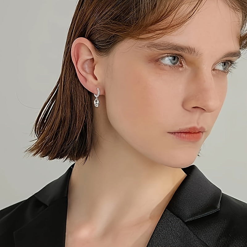 Gothic Chic Skull Dangle Earrings - Hypoallergenic Nickel-Free Copper, Sparkling Cubic Synthetic Zirconia Accents, Perfect for Halloween Parties, Casual Daily Wear, and Goth Fashion Enthusiasts