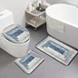 A blue abstract pattern three piece set can be purchased individually or set together for bathroom carpets