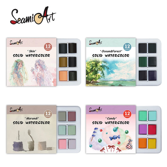 A set of 12 color solid watercolor paint pots with ocean and candy themed labels, displayed in a box.