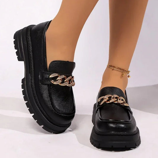 Casual flats with a metal chain, thick bottoms, and loafers style for women. Perfect for spring, these platform PU leather round-toe shoes offer a vintage charm and are available in plus sizes.