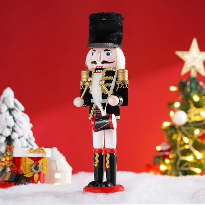 Nutcracker figurine with Christmas decorations on a red background