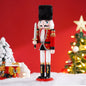 Nutcracker figurine with a festive background featuring a Christmas tree and snowman.