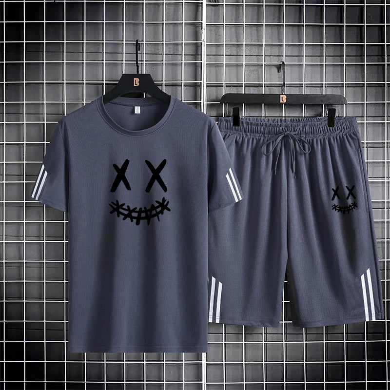 Three bar trendy men's printed sports set with smiling face pattern, mesh breathable round neck T-shirt, two-piece pants set new