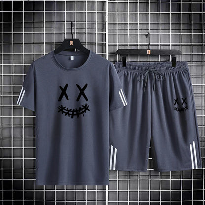 Three bar trendy men's printed sports set with smiling face pattern, mesh breathable round neck T-shirt, two-piece pants set new