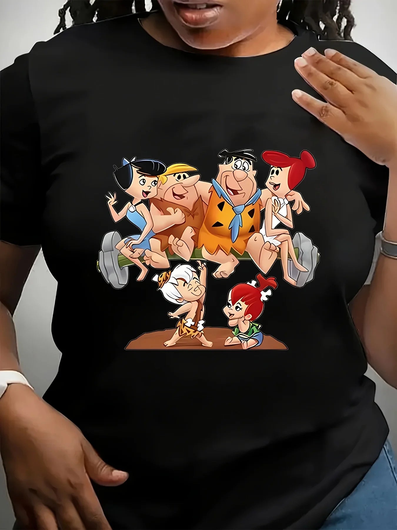 Crew Neck T-Shirt made of a polyester blend with medium stretch, designed as a casual knit top featuring a classic cartoon character graphic, suitable for women.