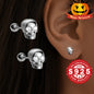 A Set of Skull-Shaped Earrings Made from S925 Sterling Silver, Featuring a Spiral Design And Adorned with Synthetic Zirconia. These Stylish And Timeless Earrings Are Perfect for Halloween And Are Designed to Minimize Allergic